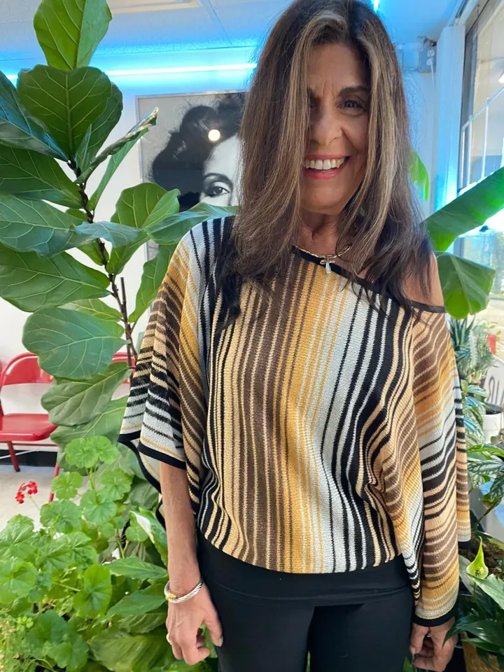 Long brunette hair with warm caramel and ash highlights