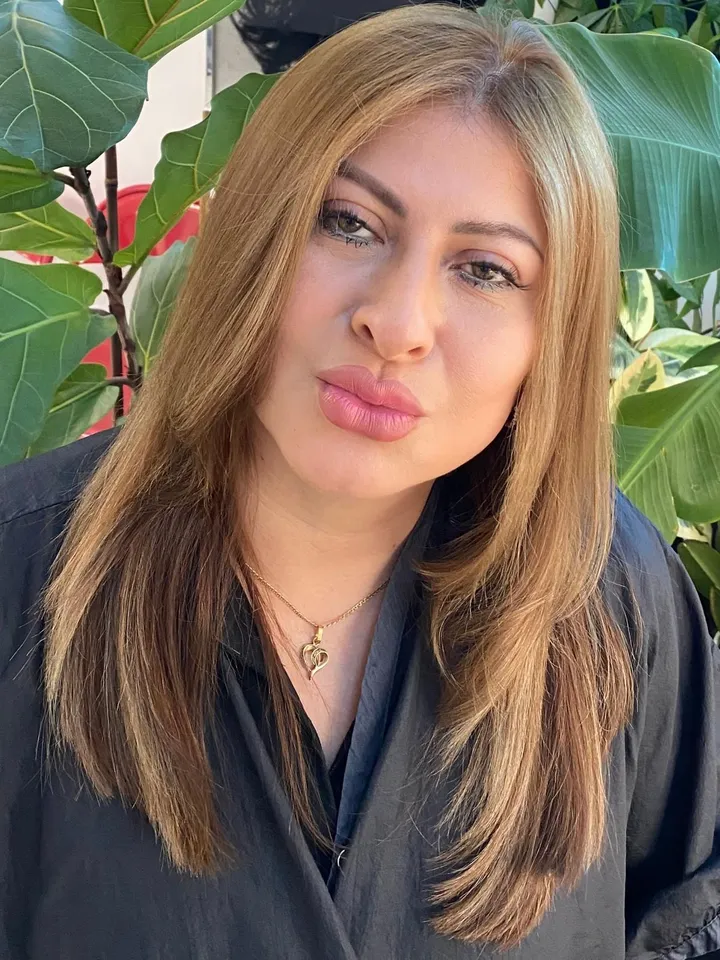 Long, sleek, light brown hair with dimensional highlights